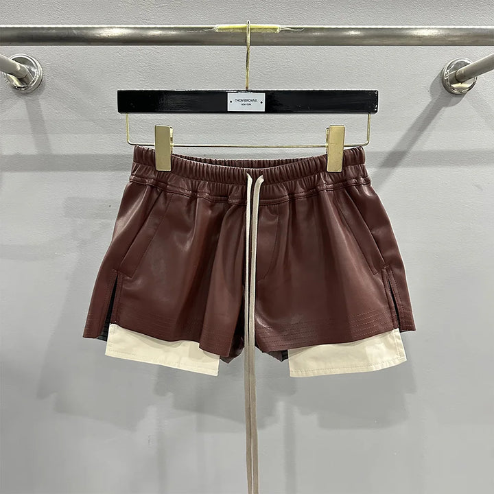 Moda feminina básica couro PU quatro bolsos de canto shorts confortáveis ​​novas calças curtas pretas versáteis