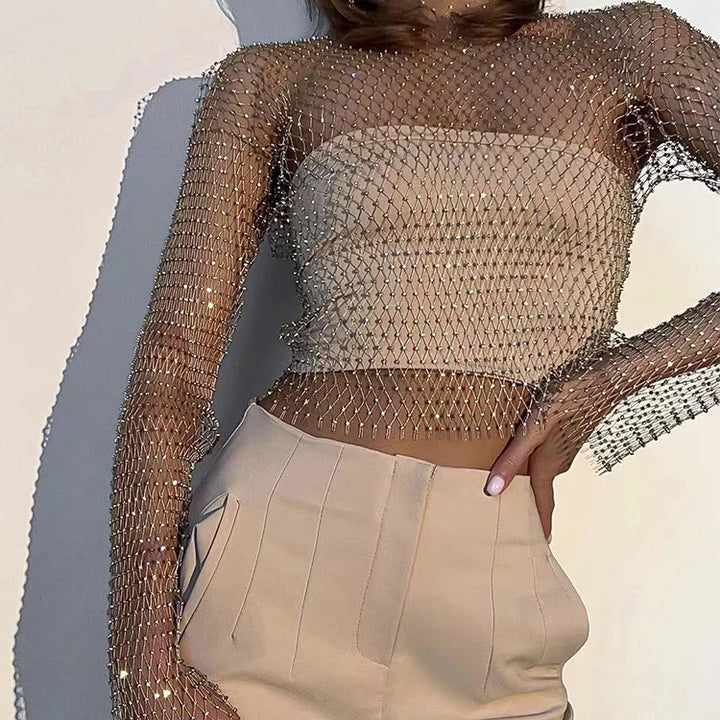 Camiseta feminina sexy de malha transparente com strass brilhante, arrastão, top curto com manga comprida, saída de praia, regata para festa e clube