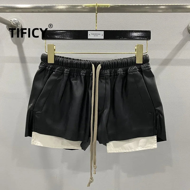 Moda feminina básica couro PU quatro bolsos de canto shorts confortáveis ​​novas calças curtas pretas versáteis