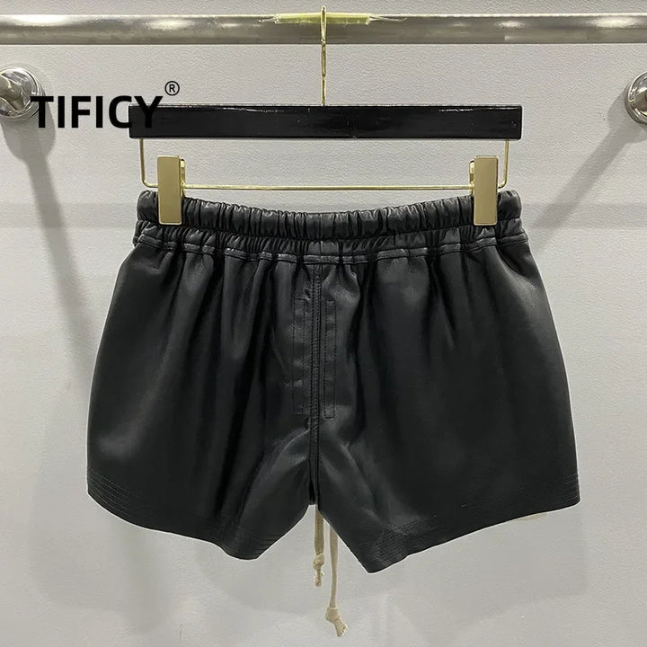 Moda feminina básica couro PU quatro bolsos de canto shorts confortáveis ​​novas calças curtas pretas versáteis